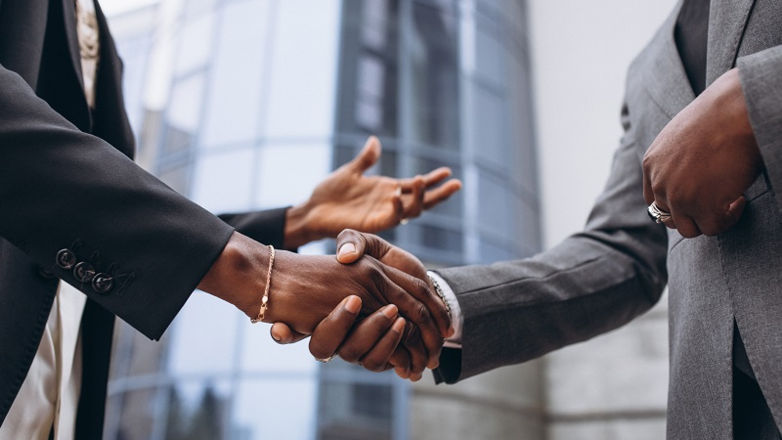 African business male people shaking hands