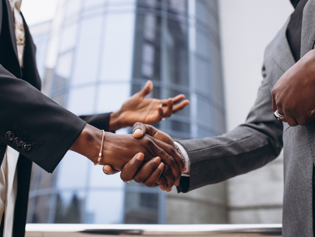 African business male people shaking hands